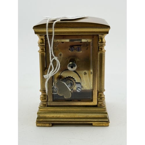 502 - Clocks: Clocks: A miniature French four glass carriage timepiece, with domed top, enamel dial and in... 