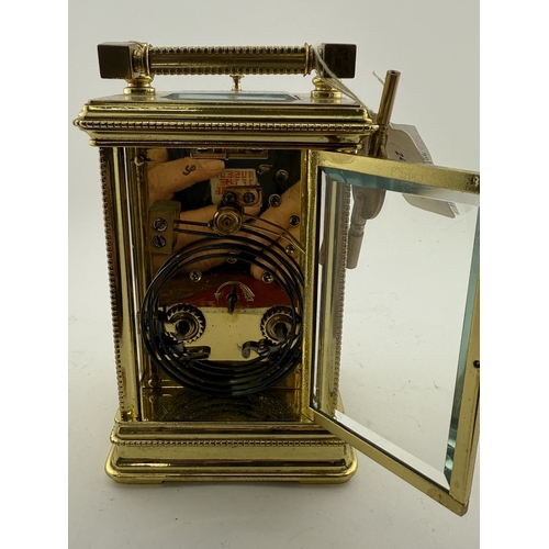 506 - Clocks: Clocks: A 19th century four glass repeater carriage clock and key, with enamel dial and Roma... 