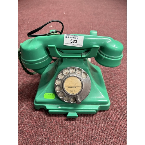 523 - Telephones: Telephones: A 200-series green bakelite telephone, impressed mark 164 57, with exchange ... 