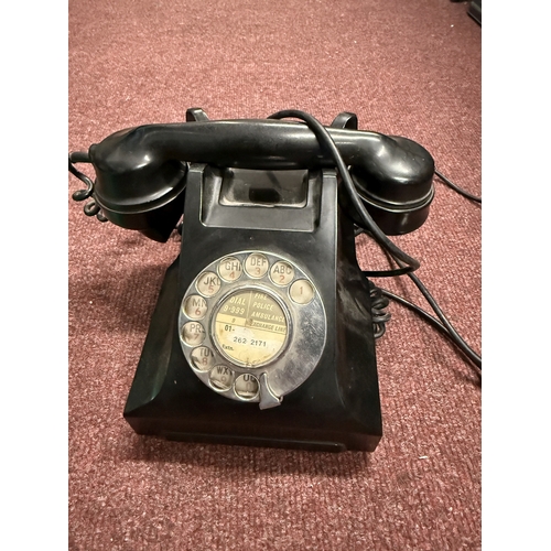 523 - Telephones: Telephones: A 200-series green bakelite telephone, impressed mark 164 57, with exchange ... 