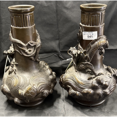 541 - Oriental: Oriental: A pair of Japanese late Meiji bronze bottle style vases, the oval body cast with... 