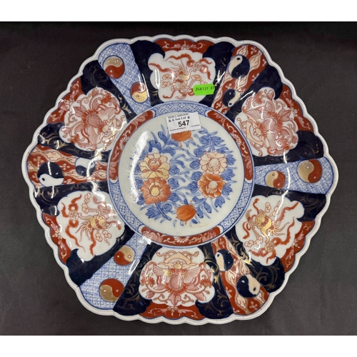 547 - Oriental: Oriental: A Japanese hexagonal Imari charger, painted in traditional colours with flowers ... 