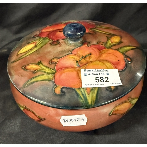 582 - Ceramics: Ceramics: . A Walter Moorcroft African Lily bowl and cover, circa 1950s, the cover with WM... 