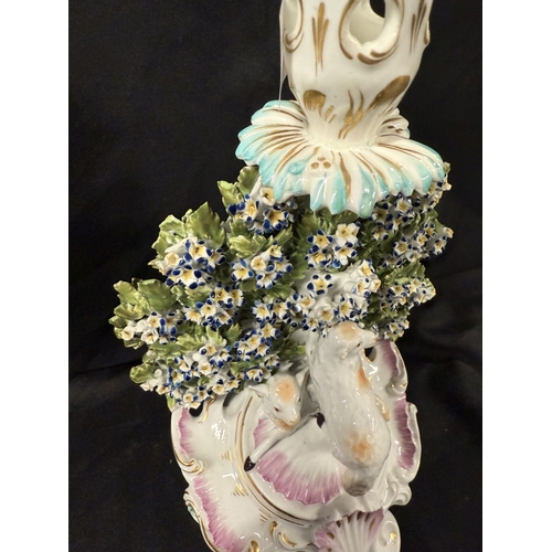 589 - Ceramics Ceramics: Derby chamberstick with bocage, - two lambs on a scrolled rococo base. Thumbed ha... 