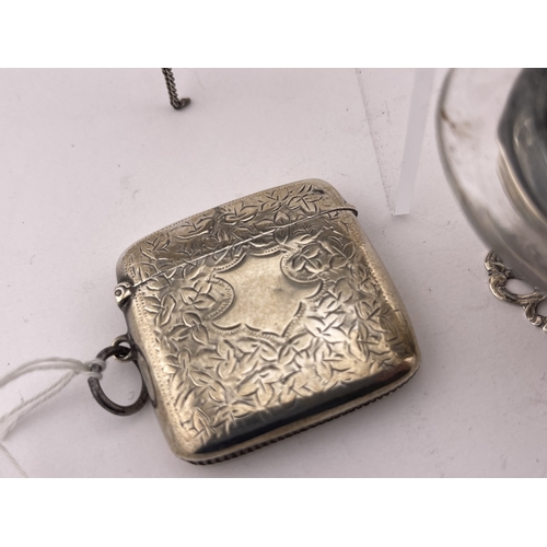 612 - Silver and White Metal: Silver and White Metal: A silver vesta case, a round box simulating a stack ... 