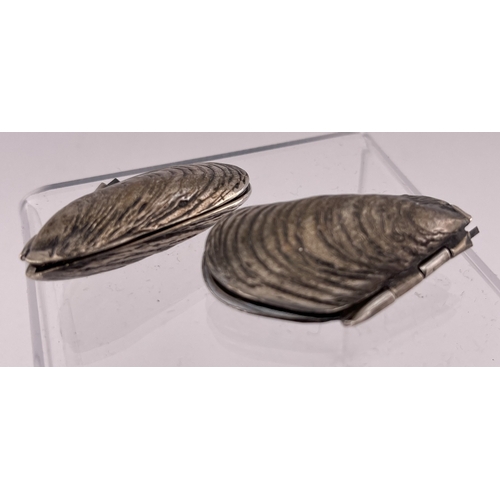 614 - Hallmarked Silver: Hallmarked Silver: Two boxed sterling silver folding mussel shells, a 925 marked ... 