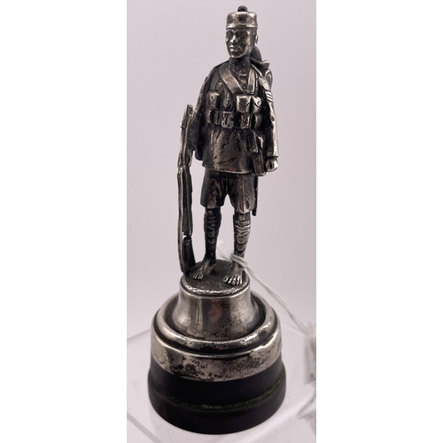 615 - Objects of Vertu: Objects of Vertu: A silver figure of a Gurkha sergeant in uniform, Goldsmiths &... 