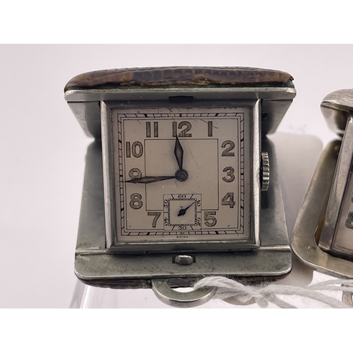 620 - Watches: Watches: Three Art Deco folding purse watches, one silver cased, hallmarked for Birmingham ... 