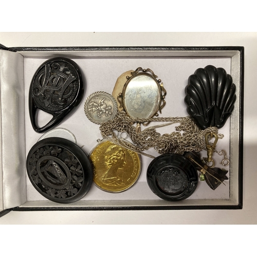 634 - Jewellery: Jewellery: A yellow metal double sided portrait pendant, an Irish bog oak brooch, a silve... 