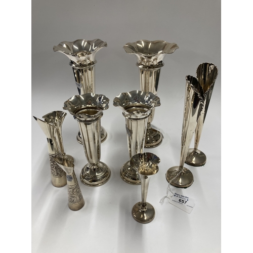 657 - Hallmarked Silver: Hallmarked Silver: A pair of trumpet vases, London 1928, with loaded bases, 22cm;... 