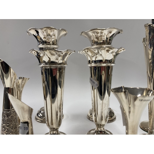 657 - Hallmarked Silver: Hallmarked Silver: A pair of trumpet vases, London 1928, with loaded bases, 22cm;... 