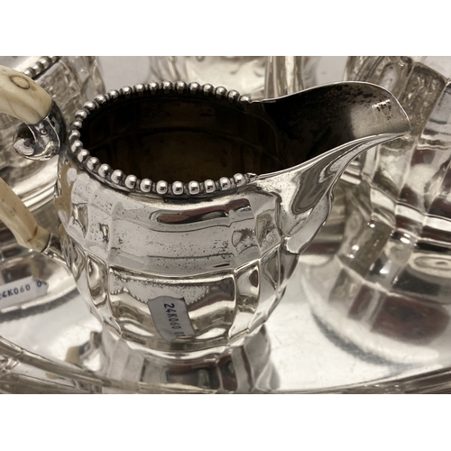 660a - Continental Silver: Continental Silver: A German five piece white metal tea set, marked with German ... 