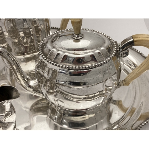 660a - Continental Silver: Continental Silver: A German five piece white metal tea set, marked with German ... 