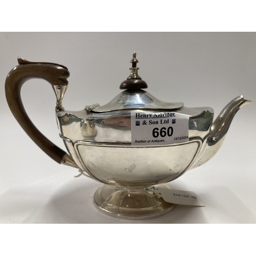 660 - Hallmarked Silver: Hallmarked Silver: A bachelors teapot, London 1921, with ebonised handle and repl... 