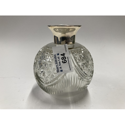 684 - Vanity: Vanity: A globular cut glass scent bottle with silver top, slightly rubbed Birmingham hallma... 