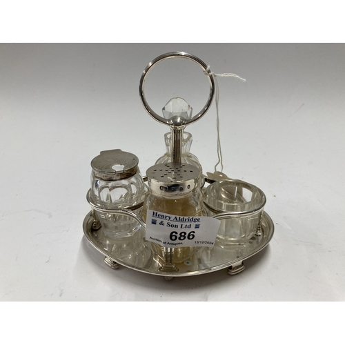 686 - Hallmarked Silver: Hallmarked Silver: A Scottish silver cruet stand with reeded handle, Edinburgh 19... 