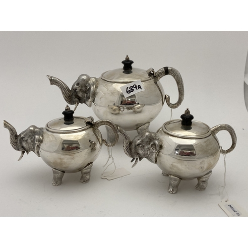 689a - Silver: Silver: An Indian three piece tea set by Cooke & Kelvey, each piece bearing their hallma... 