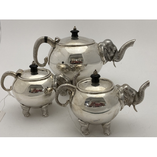 689a - Silver: Silver: An Indian three piece tea set by Cooke & Kelvey, each piece bearing their hallma... 