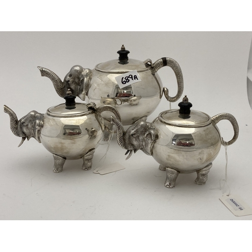 689a - Silver: Silver: An Indian three piece tea set by Cooke & Kelvey, each piece bearing their hallma... 