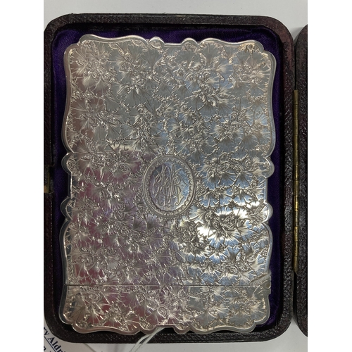 699 - Hallmarked Silver: Hallmarked Silver: A card case of shaped form, Birmingham 1878 by Frederick Marso... 