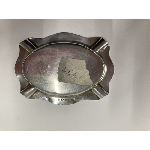 704 - Silver: Silver: A shaped silver ashtray, Birmingham 1933, with later applied White Star line burgee.... 