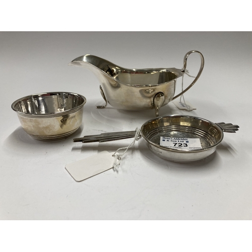 723 - Hallmarked Silver: Hallmarked Silver: An Art Deco tea strainer and bowl, Birmingham 1936, together w... 