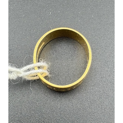 739 - Jewellery: Jewellery: A 22ct yellow gold engraved wedding band, London 1959. UK size H, 4.1g.... 