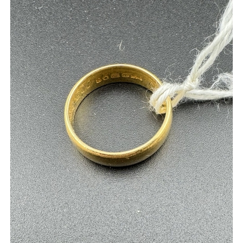 741 - Jewellery: Jewellery: A 22ct yellow gold ring, London 1966, 4.6mm band. UK size M, 3.9g.... 