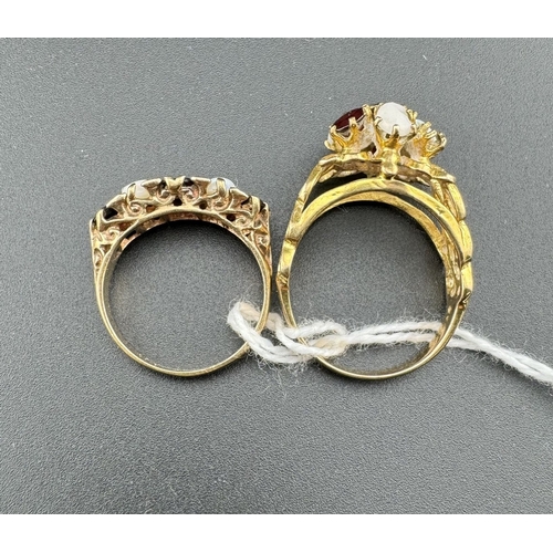 762 - Jewellery: Jewellery: A 9ct yellow gold ring set three graduated garnets divided by opals, further s... 