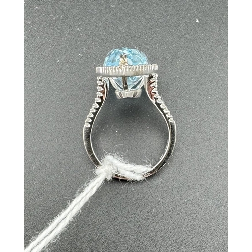 769 - Jewellery: Jewellery: An 18ct white gold ring, set a facet cut pear shaped aquamarine measuring appr... 