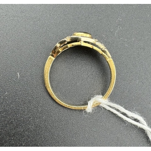 772 - Jewellery: Jewellery: A yellow metal ring, unmarked but testing as 18ct gold, set a central oval sap... 