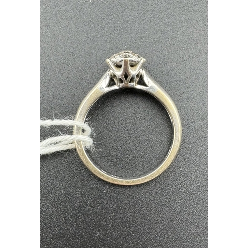 773 - Jewellery: Jewellery: An 18ct white gold ring, set a cluster of diamonds to the head with three furt... 