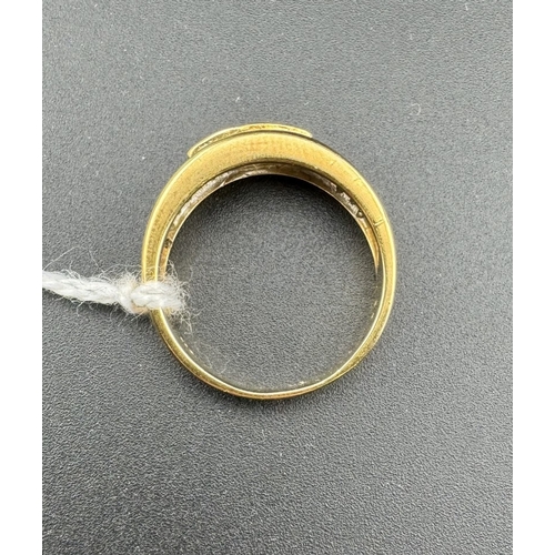 782 - Jewellery: Jewellery: A yellow metal ring, marked 750 and testing as 18ct gold, set with a central 3... 