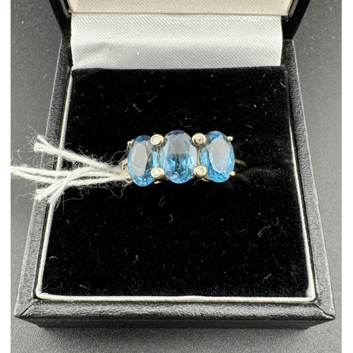 791 - Jewellery: Jewellery: A 9ct yellow gold ring set three oval topaz, UK size N, 2.5g... 