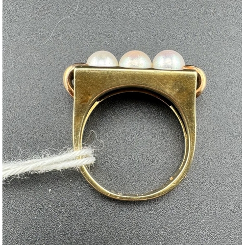 794 - Jewellery: Jewellery: A yellow metal ring, marked 585 and testing as 14ct gold, set three lustrous p... 