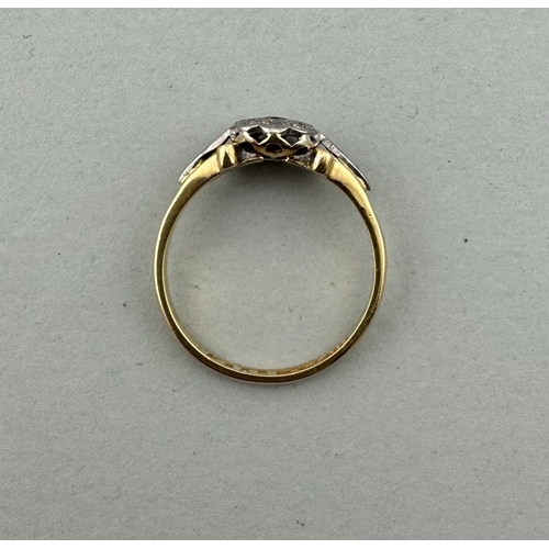 801 - Jewellery: Jewellery: An 18ct yellow gold ring, Birmingham 1968, set a central sapphire within a rin... 