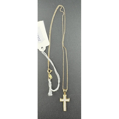 820 - Jewellery: Jewellery: A 9ct gold cross pendant, set all over with small diamonds in white metal, on ... 