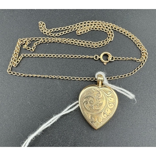 823 - Jewellery: Jewellery: An engraved heart shaped 9ct gold locket on a 48cm 9ct gold chain, combined we... 