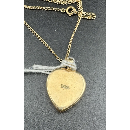 823 - Jewellery: Jewellery: An engraved heart shaped 9ct gold locket on a 48cm 9ct gold chain, combined we... 