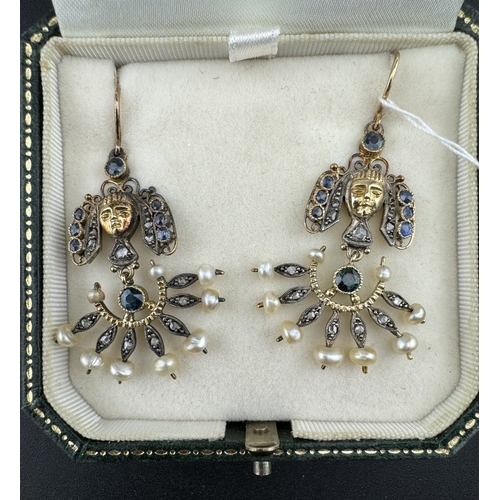 828 - Jewellery: Jewellery; A boxed pair of Egyptian revival yellow metal drop earrings, set with diamonds... 