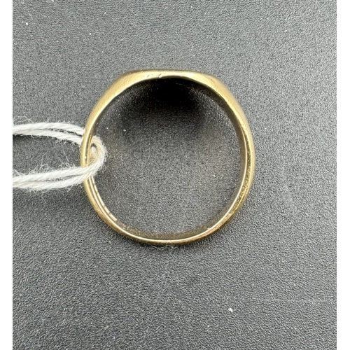 834 - Jewellery: Jewellery: A man's 9ct gold signet ring, the table set a small diamond. UK size U, 6.4g.... 