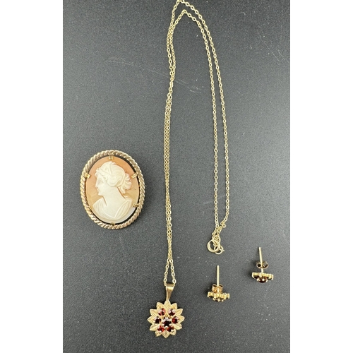 838 - Jewellery: Jewellery: A 9ct gold and garnet cluster pendant necklace, with matching earrings, togeth... 