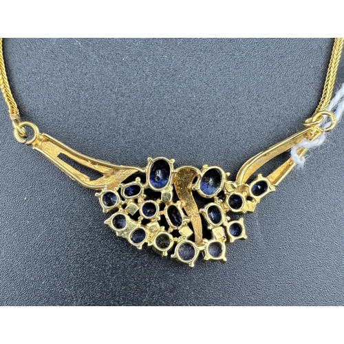 847 - Jewellery: Jewellery: A yellow metal (tests 18ct gold) necklace, the ornate butterfly style integral... 