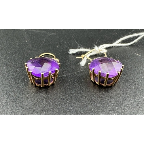 851 - Jewellery: Jewellery: Boxed 9ct gold mounted facet cut amethyst earrings, each cushion cut stone app... 