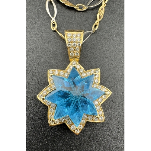 858 - Jewellery: Jewellery: An impressive yellow metal eight pointed star pendant, engraved 18k and testin... 