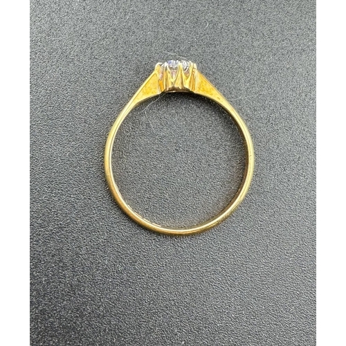 882 - Jewellery: Jewellery: An 18ct yellow gold solitaire ring, set a single white stone. UK size R, 2.1g;... 