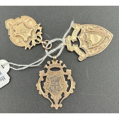 884 - Militaria Militaria: Three 9ct rose gold fob medals presented to NO779 Sergent WE. Moore 1909. 1st G... 