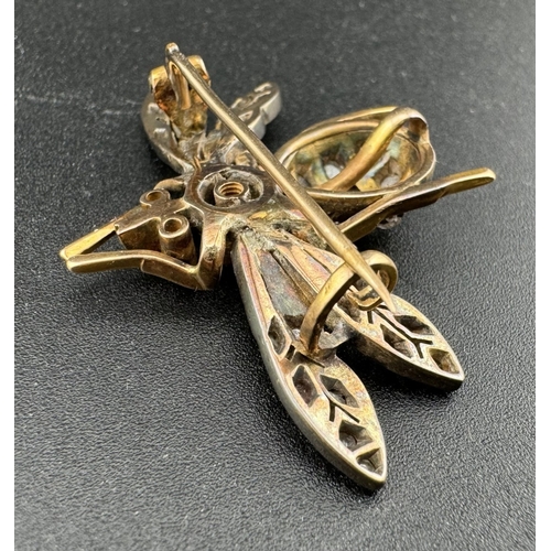 897 - Jewellery: Jewellery: A late 19th century yellow metal brooch in the form of a bee, the wings and ab... 