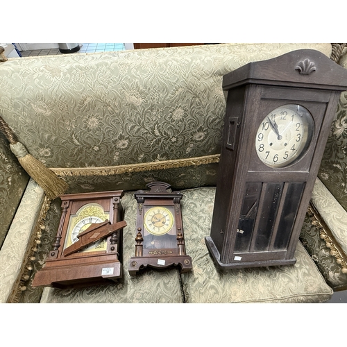 91 - Clocks: Clocks: 20th cent clocks, two mantel clocks and one wall clock.