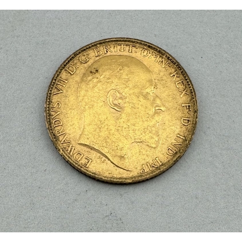 913 - Coins: Coins: A 1910 Edward VII gold half sovereign.